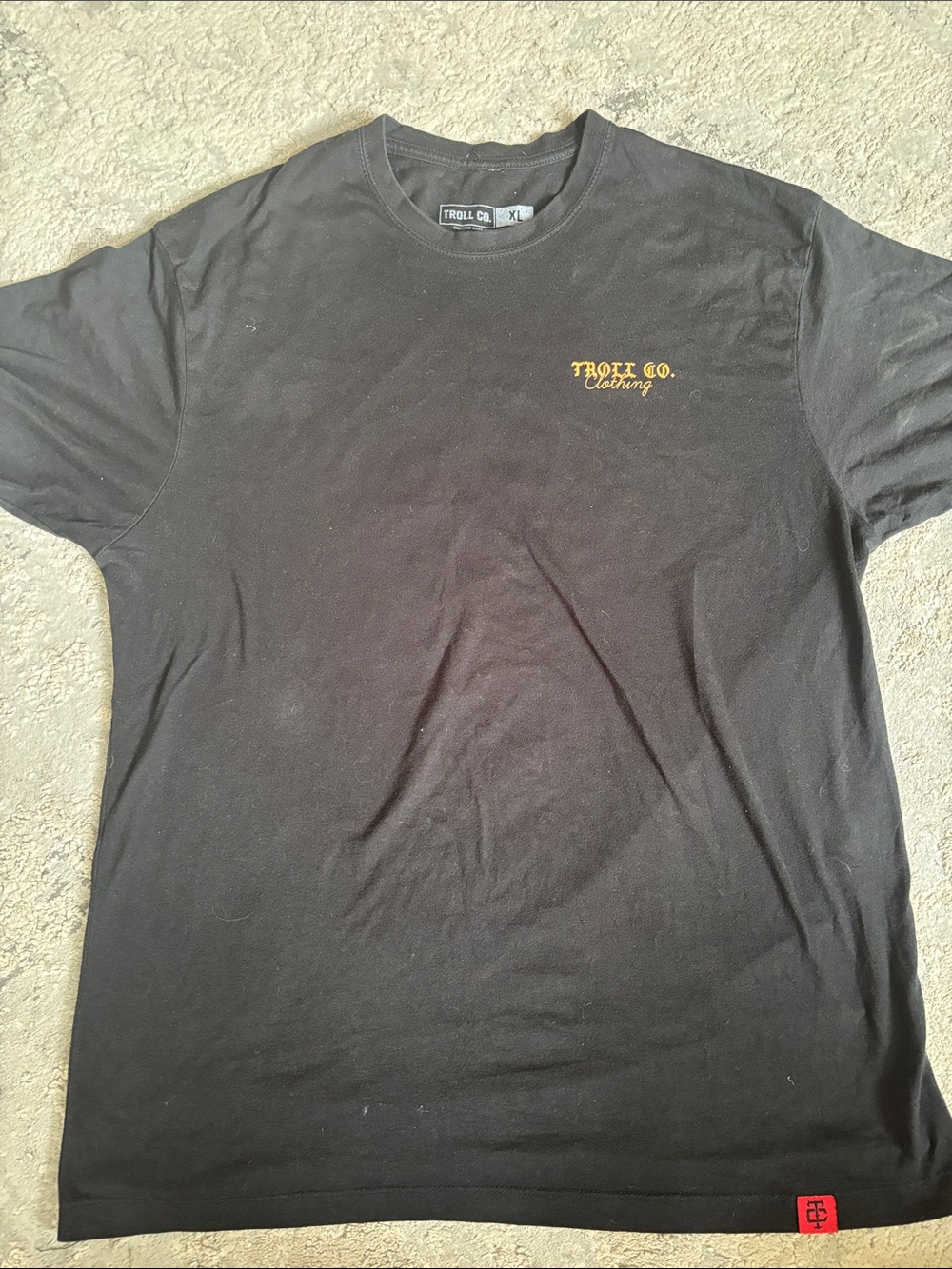 Trolls Black Short Sleeve Tee with Yellow Script Logo